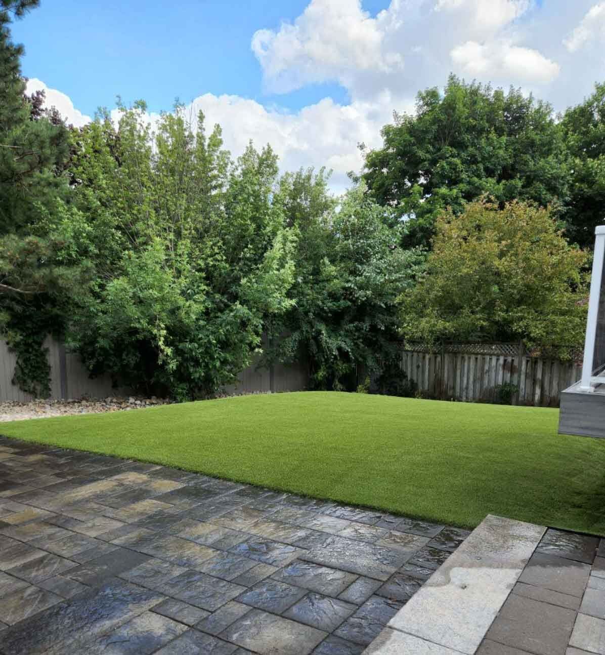 Synthetic turf in backyard